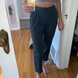 Pleated dark green sweatpants